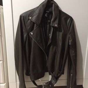 Green jacket has belt